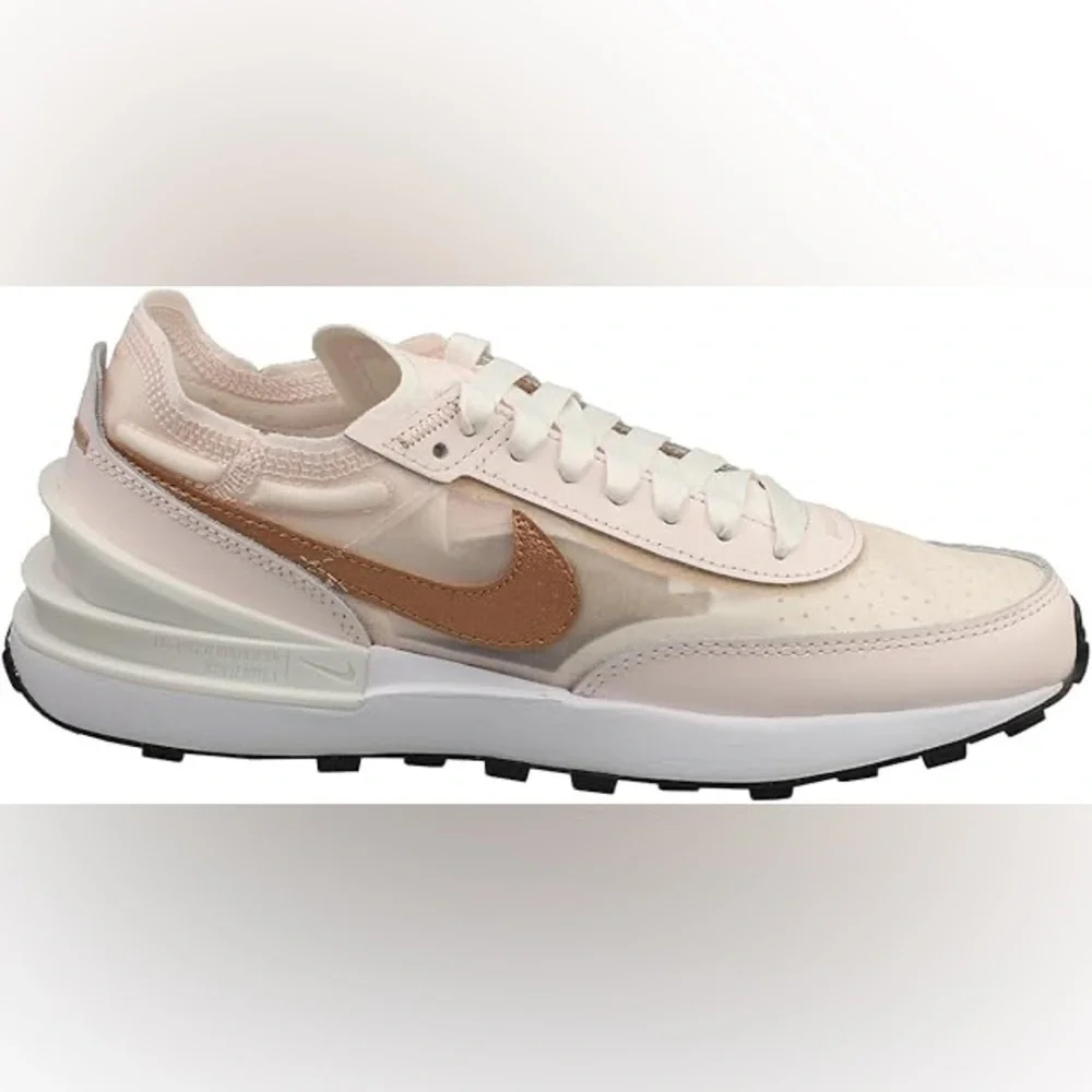 Nike Women's Sneakers in White with Metallic Rose Gold Swoosh